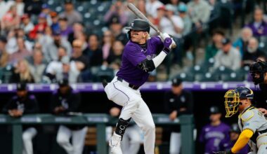 Apr 8, 2025; Denver, Colorado, USA; Colorado Rockies right fielder Zac Veen (13) at bat in the second inning against the Milwaukee Brewers at Coors Field. Mandatory Credit: Isaiah J. Downing-Imagn Images