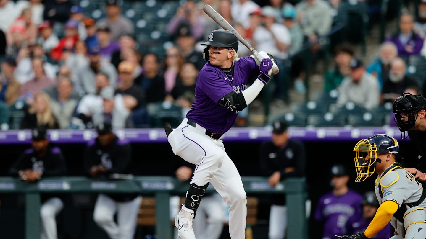 Apr 8, 2025; Denver, Colorado, USA; Colorado Rockies right fielder Zac Veen (13) at bat in the second inning against the Milwaukee Brewers at Coors Field. Mandatory Credit: Isaiah J. Downing-Imagn Images