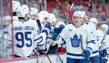 Dec 4, 2025; Raleigh, North Carolina, USA; Toronto Maple Leafs center Bobby McMann (74) celebrates his goal against the Carolina Hurricanes during the first period at Lenovo Center. Mandatory Credit: James Guillory-Imagn Images