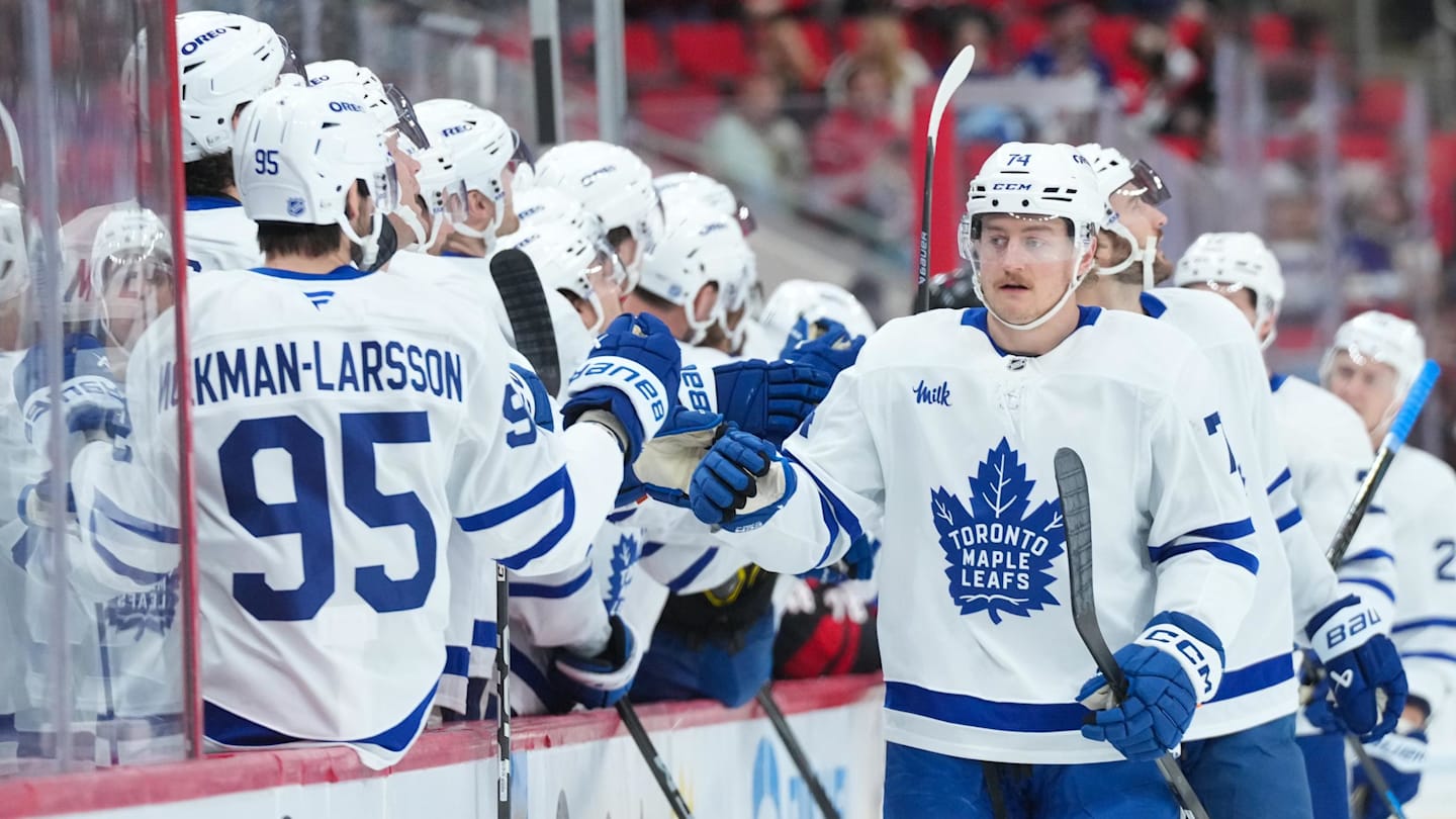 Dec 4, 2025; Raleigh, North Carolina, USA; Toronto Maple Leafs center Bobby McMann (74) celebrates his goal against the Carolina Hurricanes during the first period at Lenovo Center. Mandatory Credit: James Guillory-Imagn Images