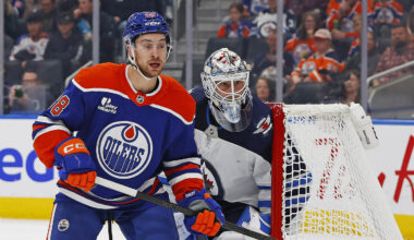 Sep 26, 2025; Edmonton, Alberta, CAN; Edmonton Oilers forward Andrew Mangiapane (88) looks for a pass in front of Winnipeg Jets goaltender Domenic DiVincentiis (50) during the first period at Rogers Place. Mandatory Credit: Perry Nelson-Imagn Images
