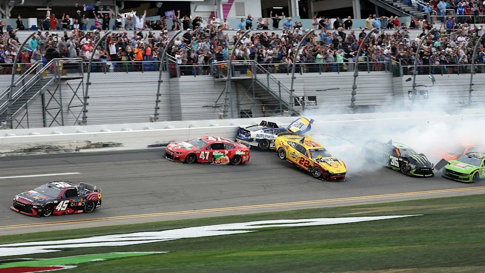 Tyler Reddick wins the Dayton 500 as a number of cars crash behind