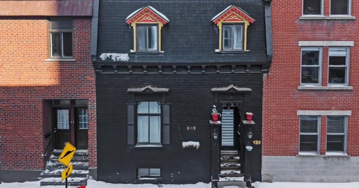 Un intérieur inattendu derrière la façade noire de cette propriété de 1880!