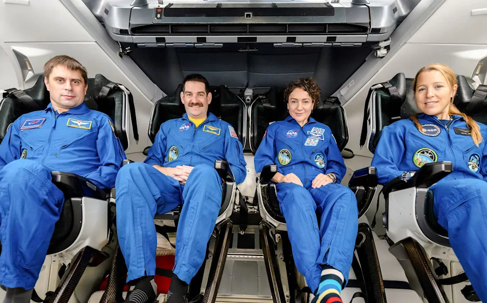 The four members of NASA’s SpaceX Crew-12 mission to the International Space Station pose together for a crew portrait inside a SpaceX Dragon spacecraft. From left are, Roscosmos cosmonaut Andrey Fedyaev, NASA astronauts Jack Hathaway and Jessica Meir, and ESA (European Space Agency) astronaut Sophie Adenot.