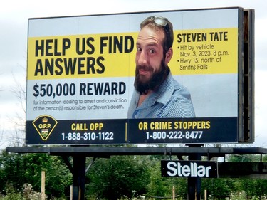 The Ontario Provincial Police has placed a billboard near the sport where Steven Tate's body was found
