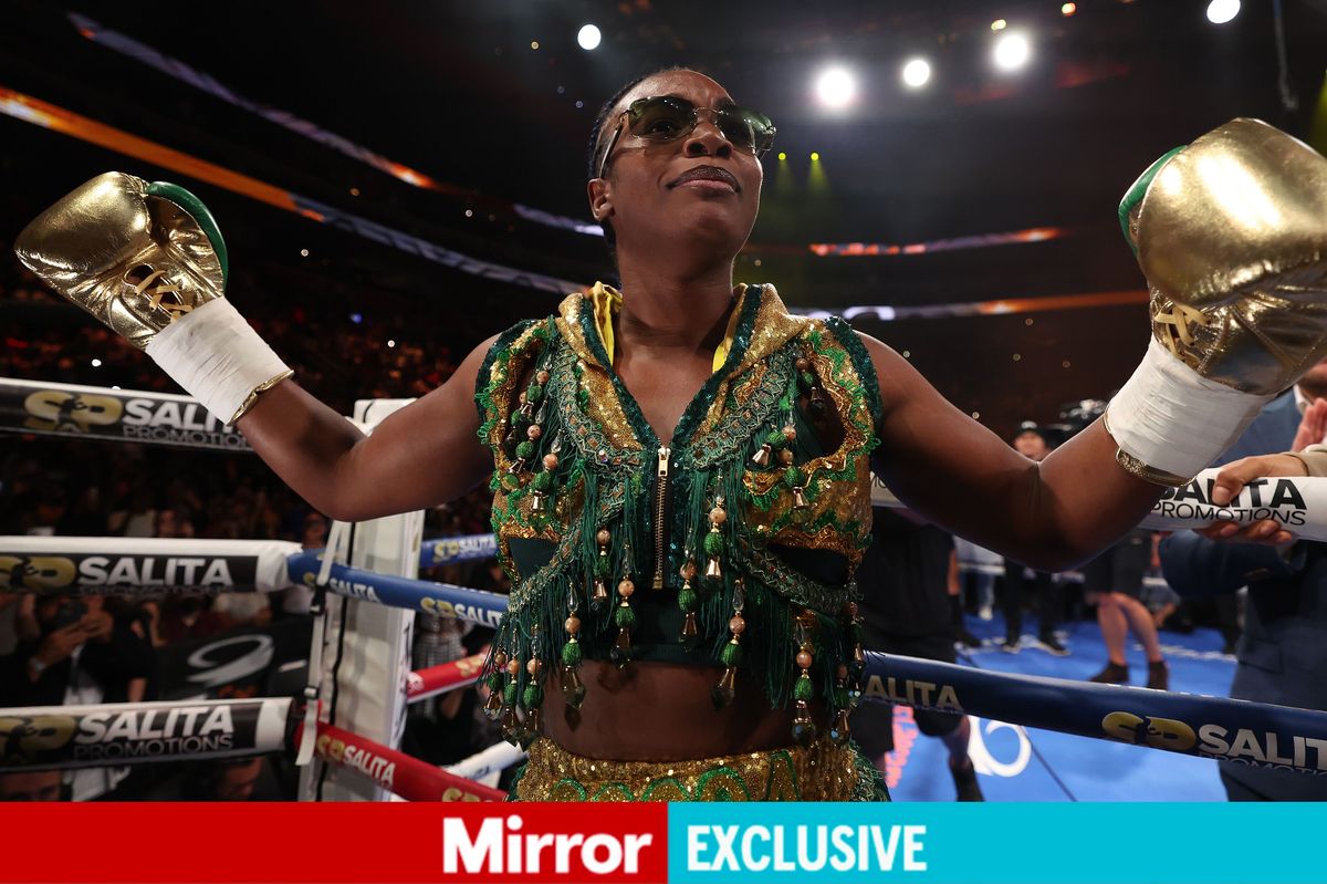 Claressa Shields acknowledges the crowd while inside the ring