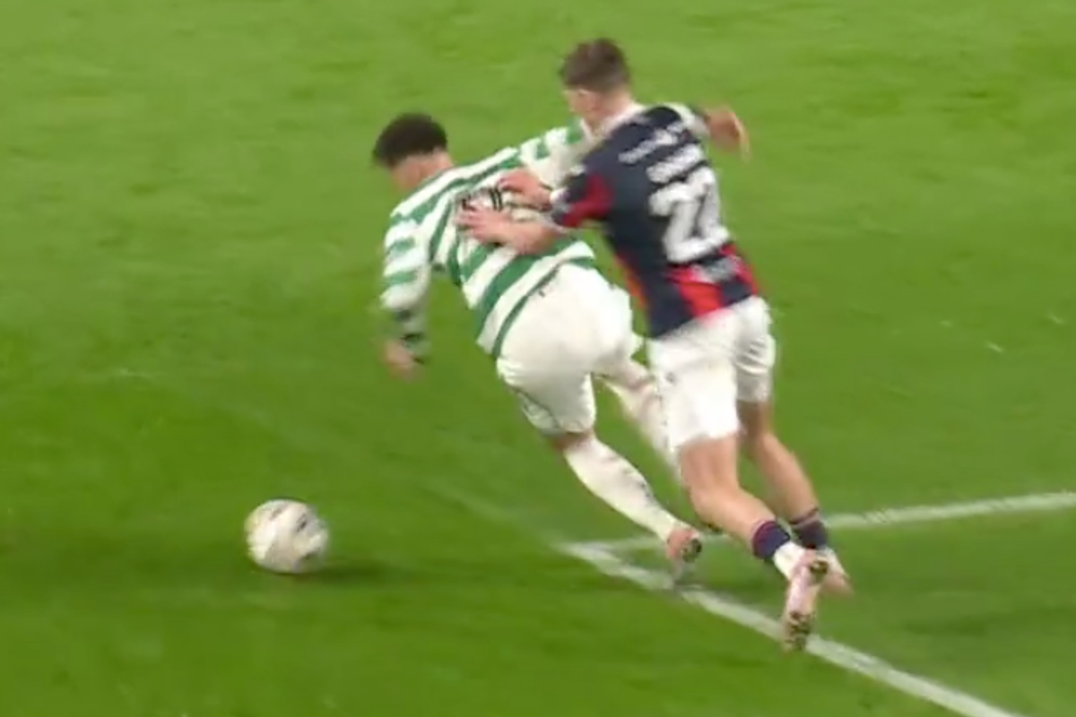 Celtic striker Tomas Cvancara goes down under pressure from Dundee's Luke Graham