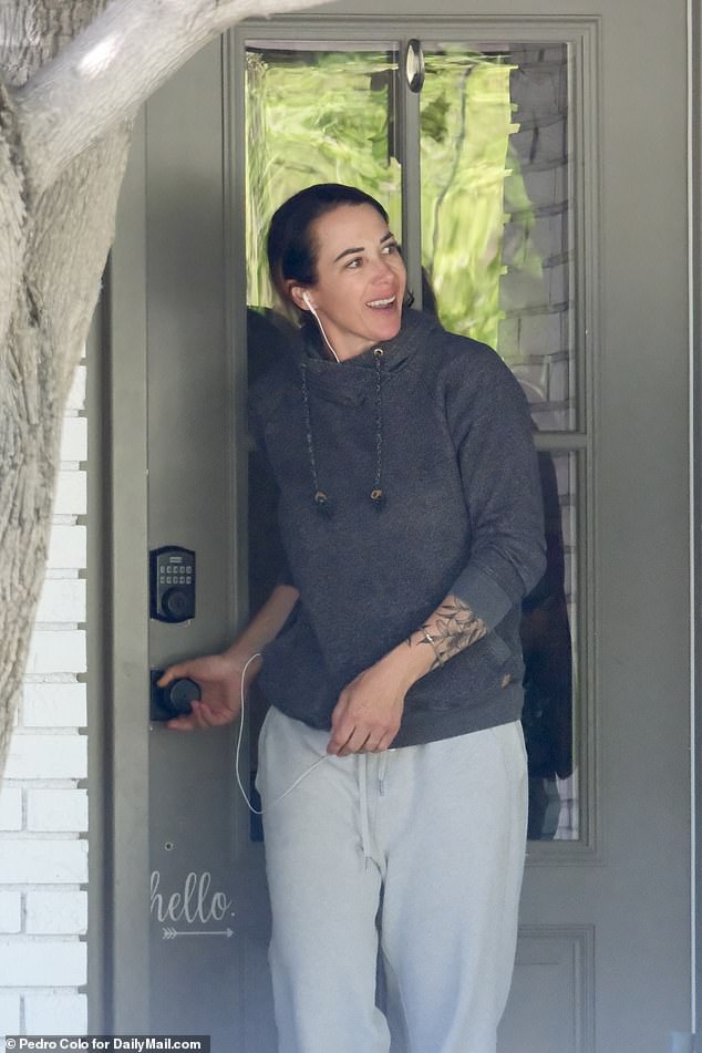 Adrienne Spohr, the sister of Serafini's wife Erin (pictured) has spoken out on her parents