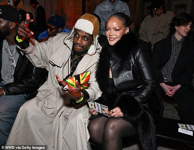 Rihanna was joined by rapper A$AP Nast on her right