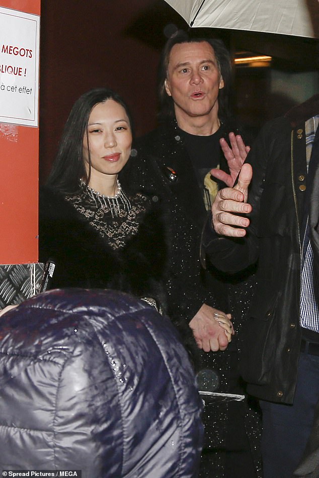 The Hollywood star was joined on the red carpet by his daughter Jane, 38, her teenage son Jackson, and his partner Min Ah (pictured), who Carrey referred to in a heartfelt speech delivered entirely in French