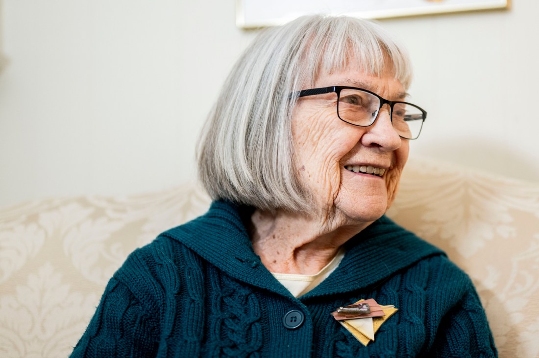 Ruth Gove smiling, head turned to the side.