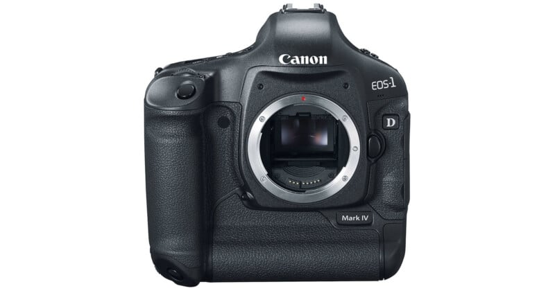 A black Canon EOS-1D Mark IV DSLR camera body with no lens attached, showing the camera mount and sensor on the front.