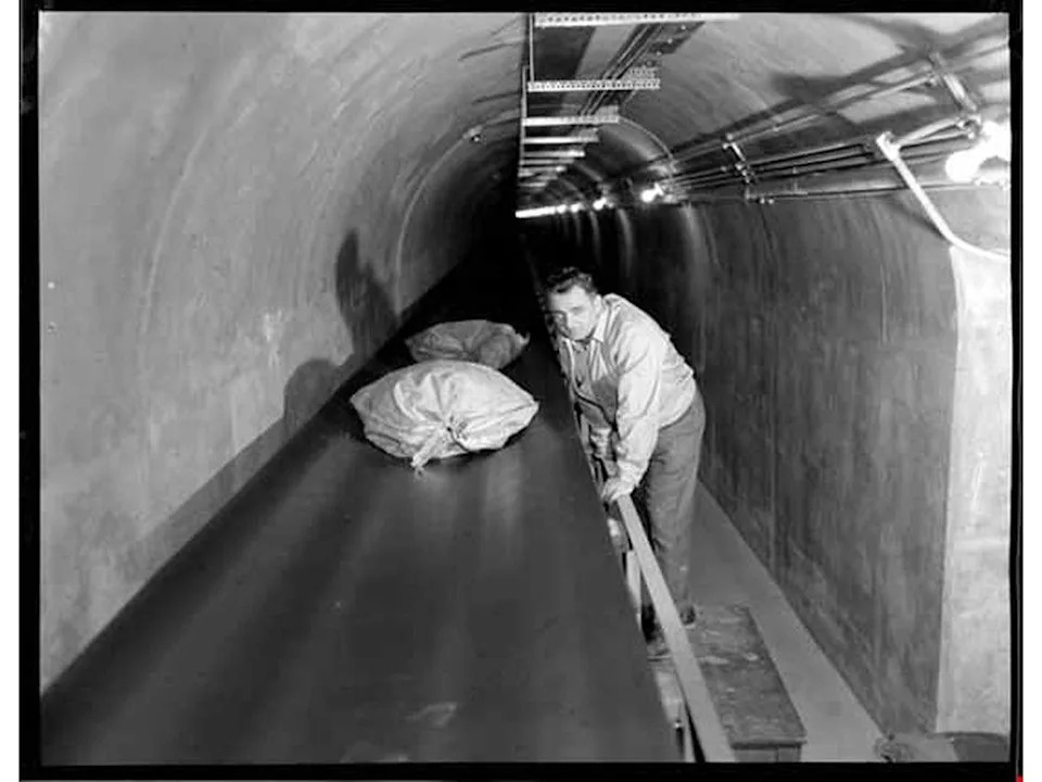 A worker inside a tunnel that once linked Vancouver’s Waterfront Station with the old Canada Post building on West Georgia Street.