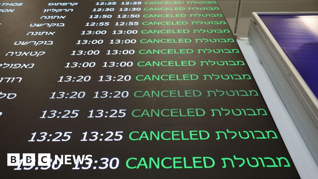 Flights cancelled as travel warnings issued after US-Israeli strikes on Iran - BBC