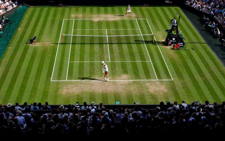 Wimbledon is played on grass courts