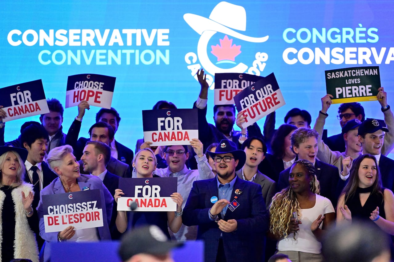 Supporters cheer on stage at the national convention for Canada's official opposition Conservative Party, in the wake of its April 2025 election loss, on the day party members vote on the future of leader Pierre Poilievre, in Calgary, Alta., January 
