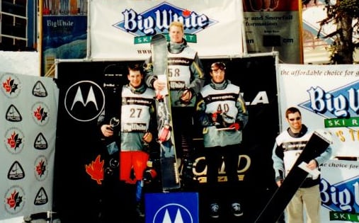 male snowboarders on podium