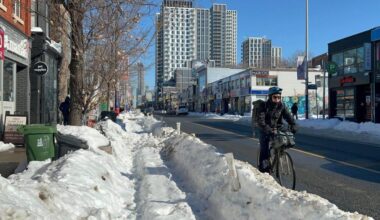 Bike lanes running along Toronto's Bloor Street remain blocked as shown on Sunday Feb. 1, 2026 a week after the city received a historic dump of snow. THE CANADIAN PRESS/Kathryn Mannie