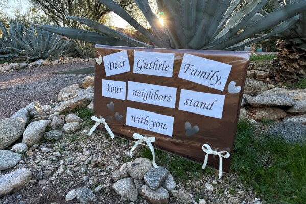 /// Neighbors of Nancy Guthrie, the daughter of "Today" host Savannah Guthrie, show support for the family in metro Tucson, Ariz., on Tuesday, Feb. 3, 2026, as the search continues to find Nancy who was reported missing. (AP Photo/Sejal Govindarao)