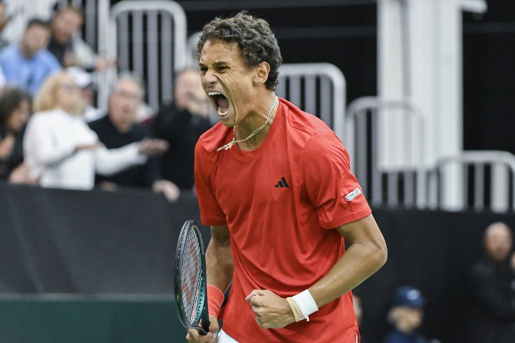 Gabriel Diallo, of Canada, reacts during his Davis Cup qualifying tennis match against Marton Fucsovics, of Hungary, in Montreal on Saturday, February 1, 2025. THE CANADIAN PRESS/Graham Hughes
