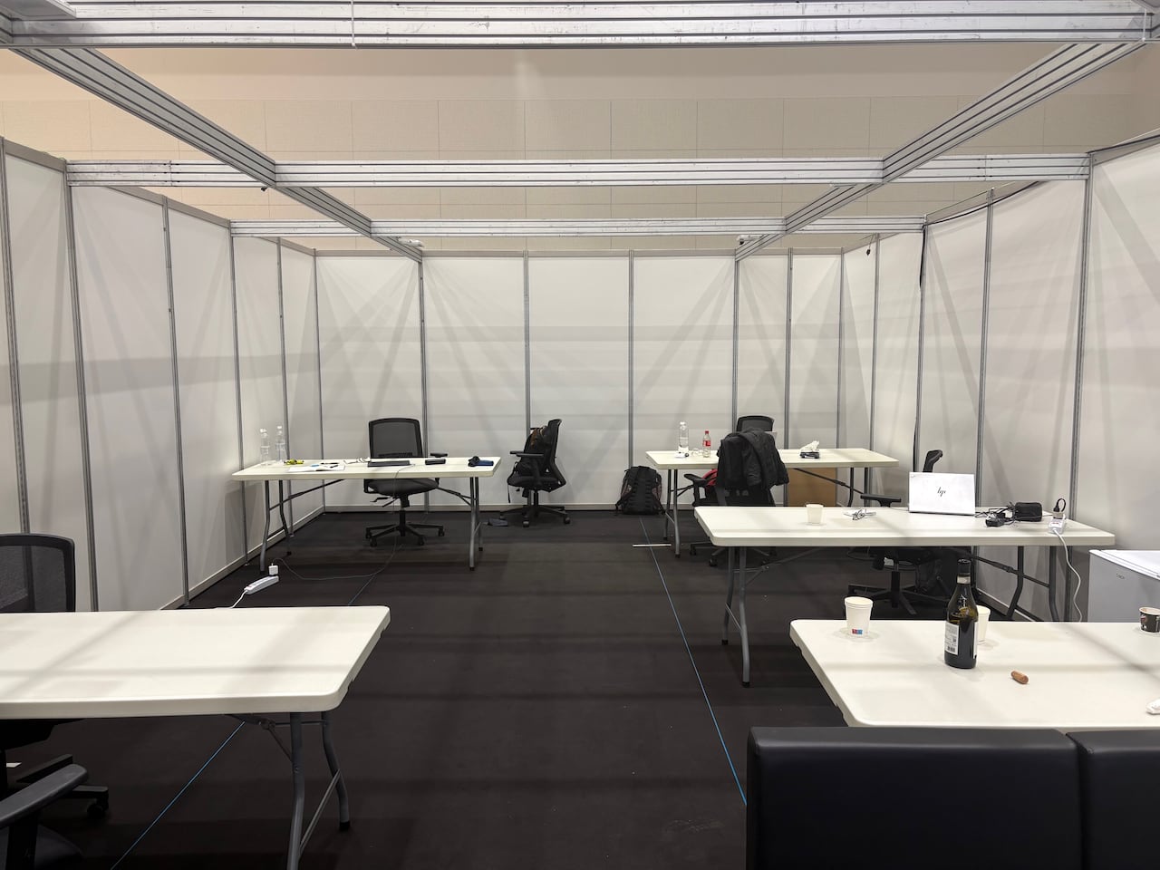 A temporary office with four desks.