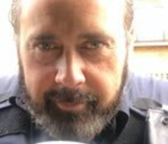 Close up selfie of a man with a coffee cup. 