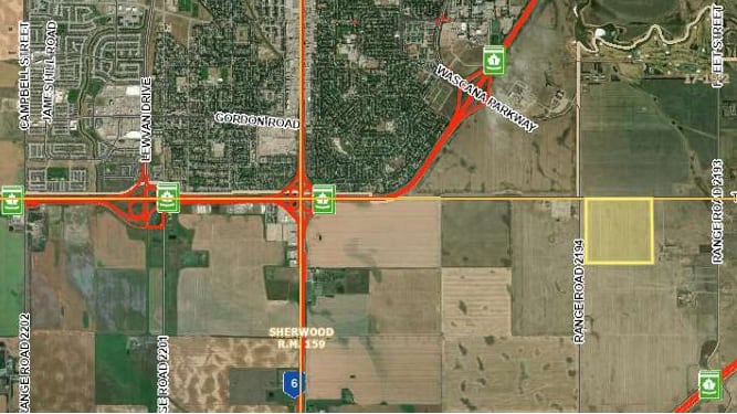 A map shows the south of Regina and a highlighted parcel of land.
