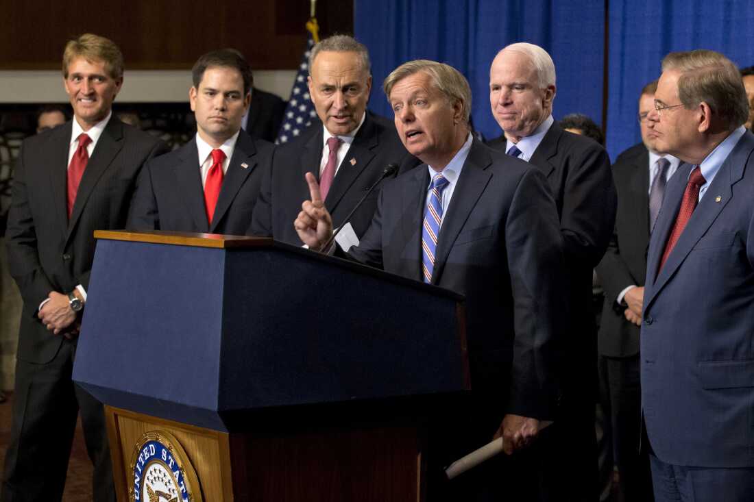 A gang of eight lawmakers, including Sen. Lindsey Graham, R-S.C., tried but failed, to pass comprehensive immigration reform in 2013. Above, from left in the gang of eight were, Sen. Jeff Flake, R-Ariz., Sen. Marco Rubio, R-Fla., Sen. Chuck Schumer, D-N.Y., Graham, Sen. John McCain, R-Ariz., and Sen. Robert Menendez, D-N.J.