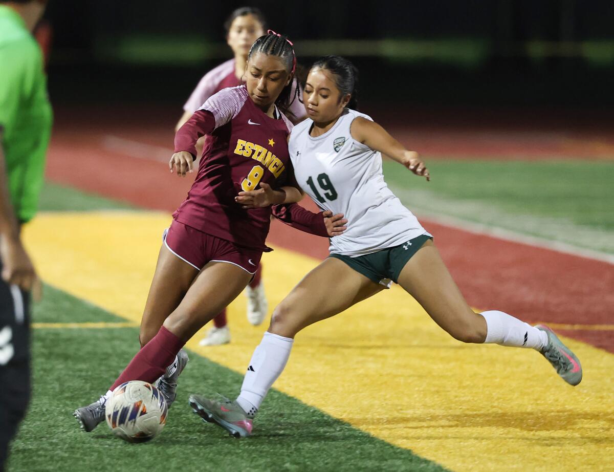 Estancia's Vanessa Pastrana (9) battles Jordyn Le (19) of South Hills for possession on Thursday.