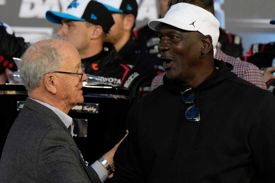 23XI Racing owner Michael Jordan speaks with CEO and Chairman of NASCAR, Jim Frantz after Tyler Reddick won the NASCAR Daytona 500 auto race at Daytona International Speedway, Sunday, Feb. 15, 2026, in Daytona Beach, Fla.