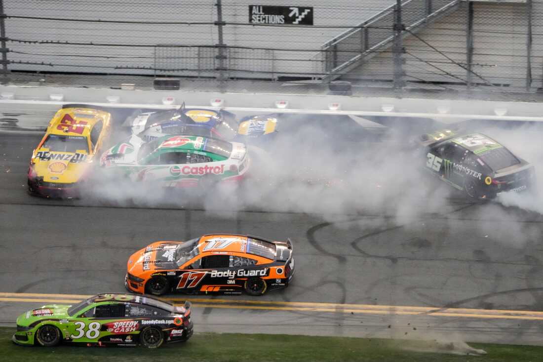 Cars crash on the checkered flag during the NASCAR Daytona 500 auto race at Daytona International Speedway, Sunday, Feb. 15, 2026, in Daytona Beach, Fla.