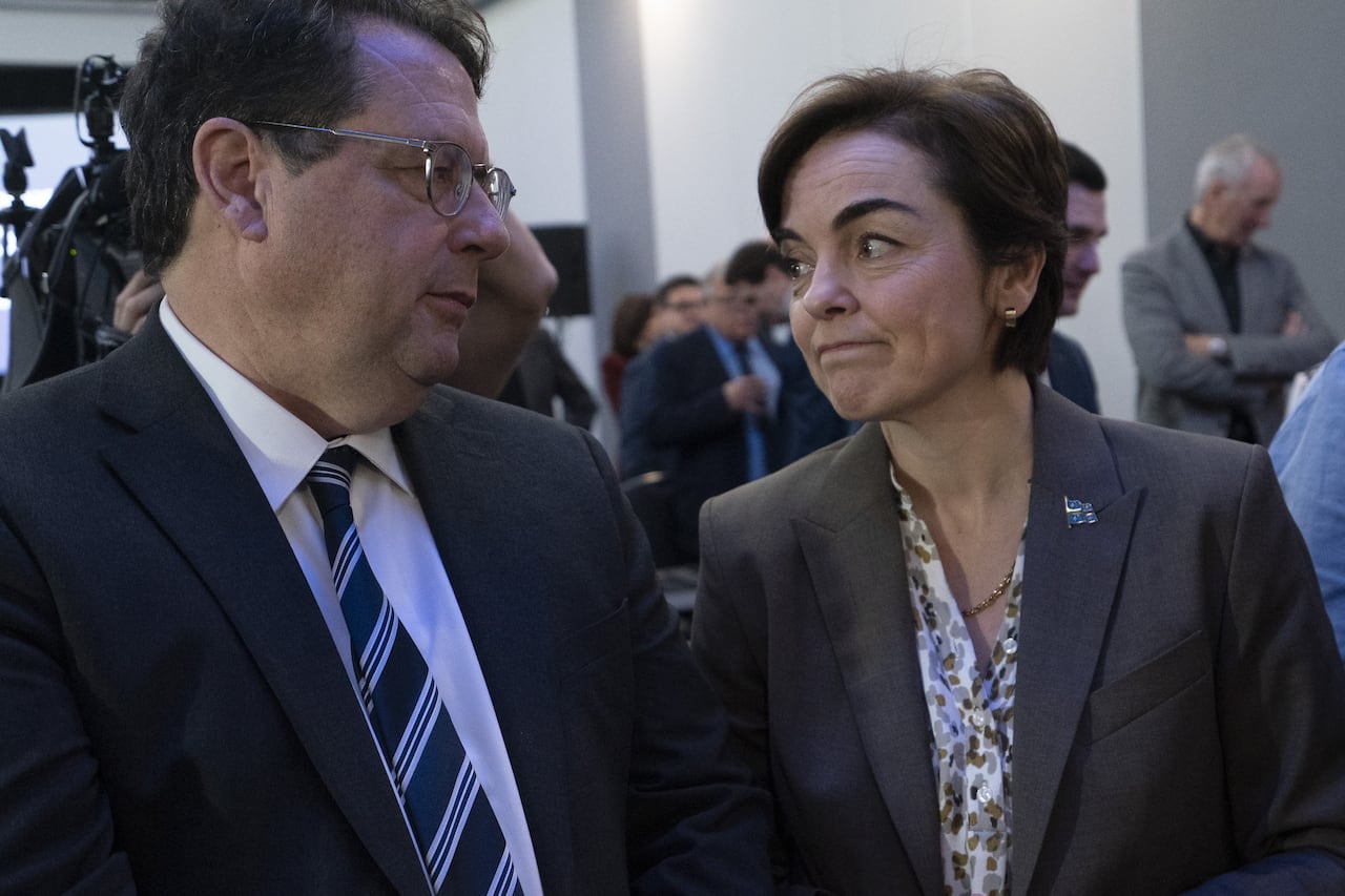 Bernard Drainville and Christine Fréchette facing each other at the CAQ caucus on Jan. 27, 2026. 
