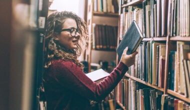 Young woman in library.