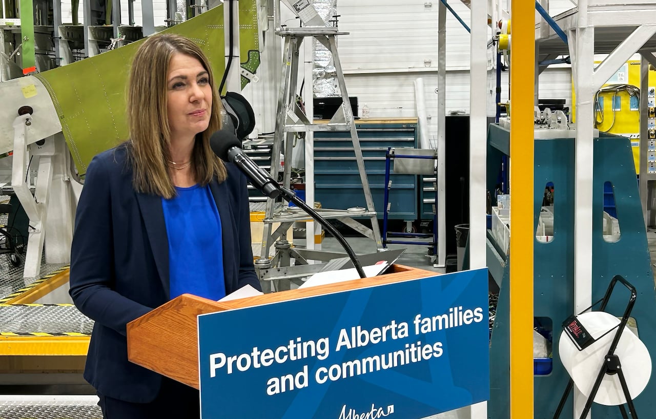 Premier Danielle Smith speaks during a news conference about provincial government investment in air tankers as part of its future wildfire response at a De Havilland Canada site in Calgary on Tuesday, Feb. 17, 2026.