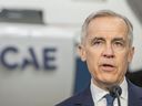 Prime Minister Mark Carney makes an announcement at CAE Inc., in Montreal, on Tuesday, Feb. 17, 2026. 