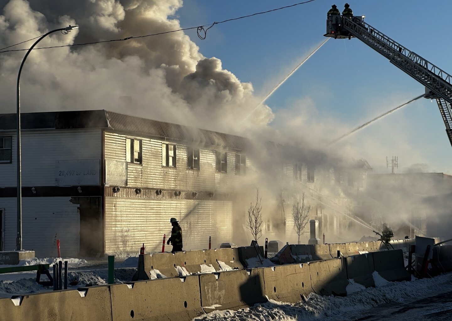 Edmonton firefighters fight blaze at vacant Jasper Place Hotel