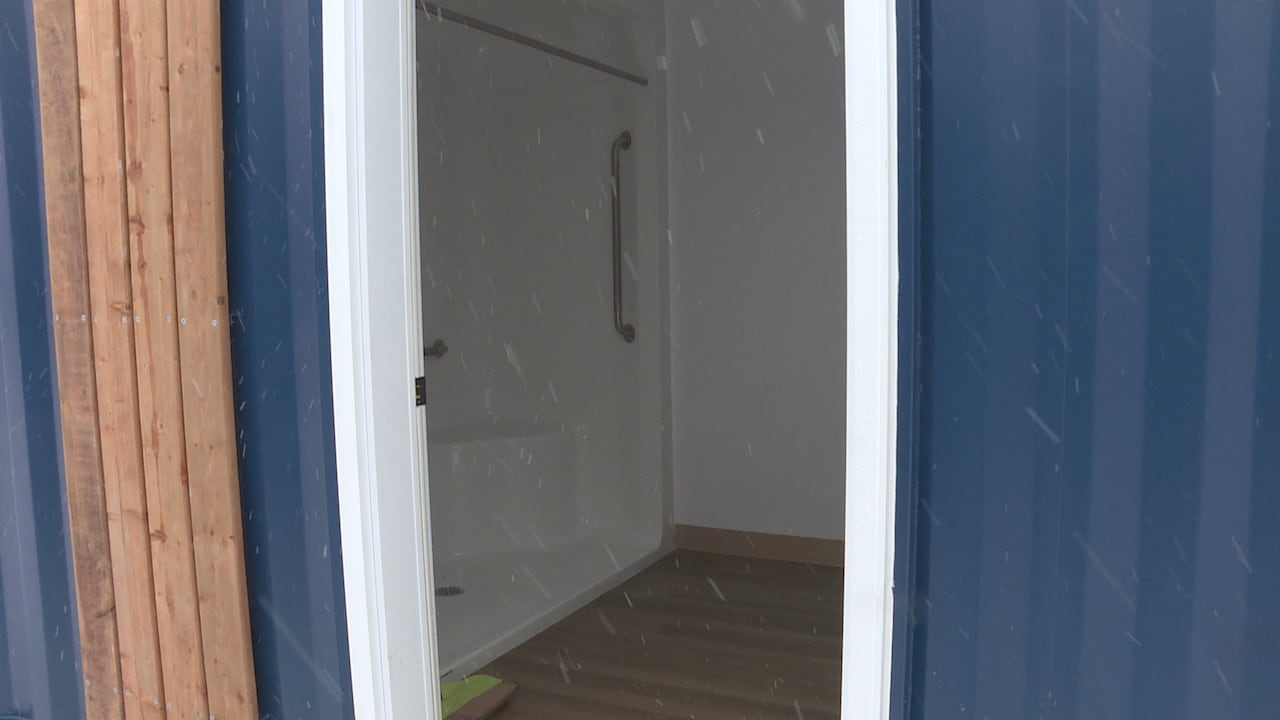 Open doo looking into a bathroom.