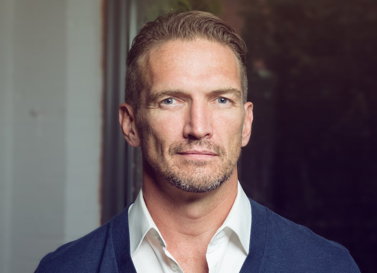 A man poses for a photo