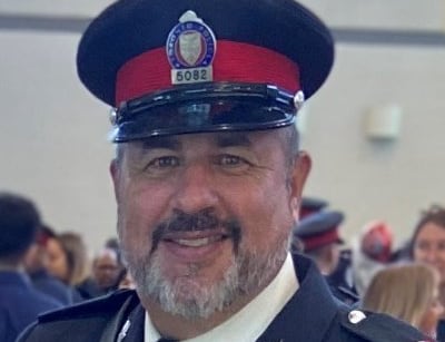 Photo of John Madeley in police uniform. 