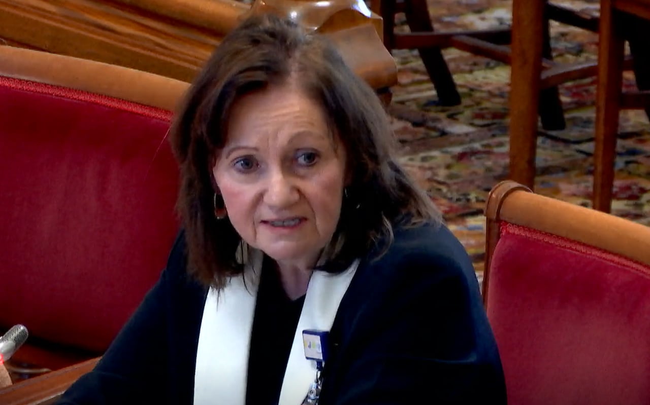 A woman sitting at a desk