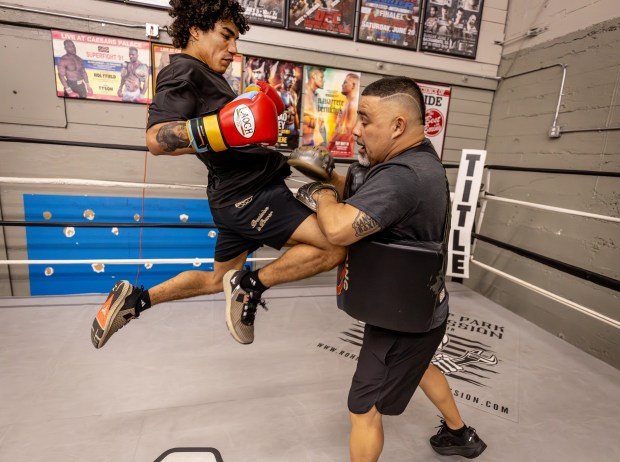 MMA fighter Imanol Rodriguez, who will be making his UFC debut on the Feb. 28 Mexico City, trains with Rosendo Sanchez Friday, Jan. 3, 2026 at the Sanchez Boxing MMA gym in Santa Rosa. (John Burgess/The Press Democrat)