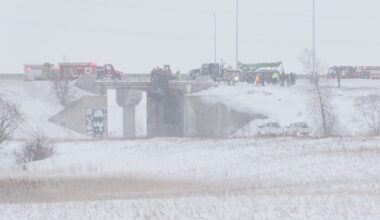 Truck hanging off Perimeter Highway bridge