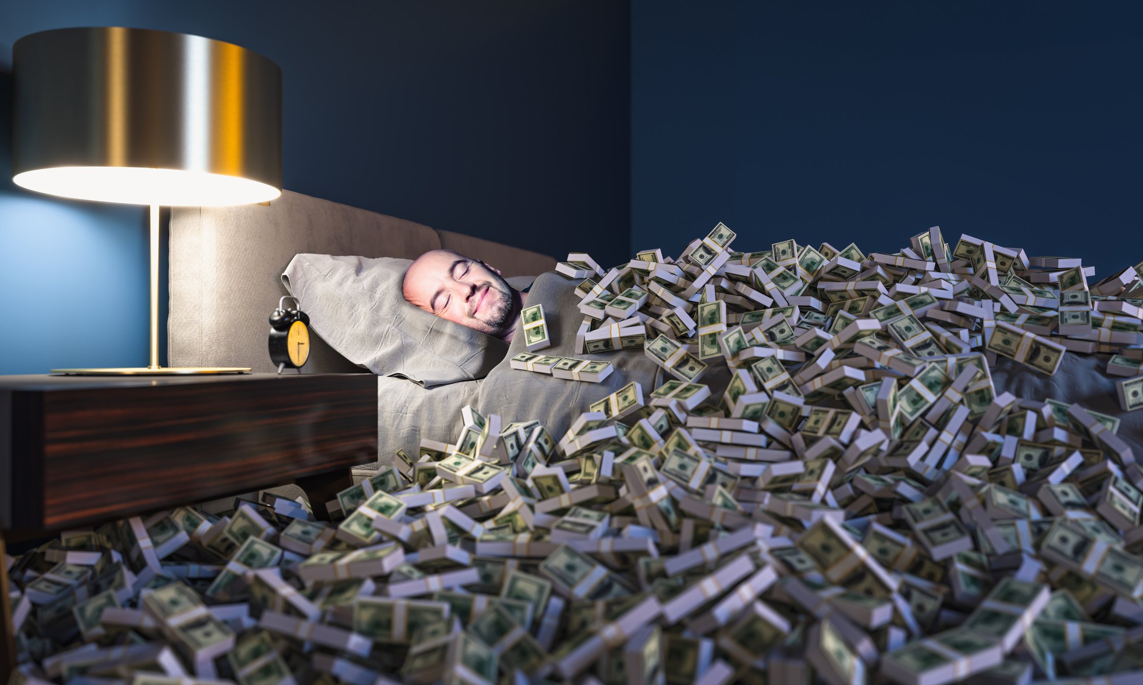 A person sleeps while surrounded by cash bundles.
