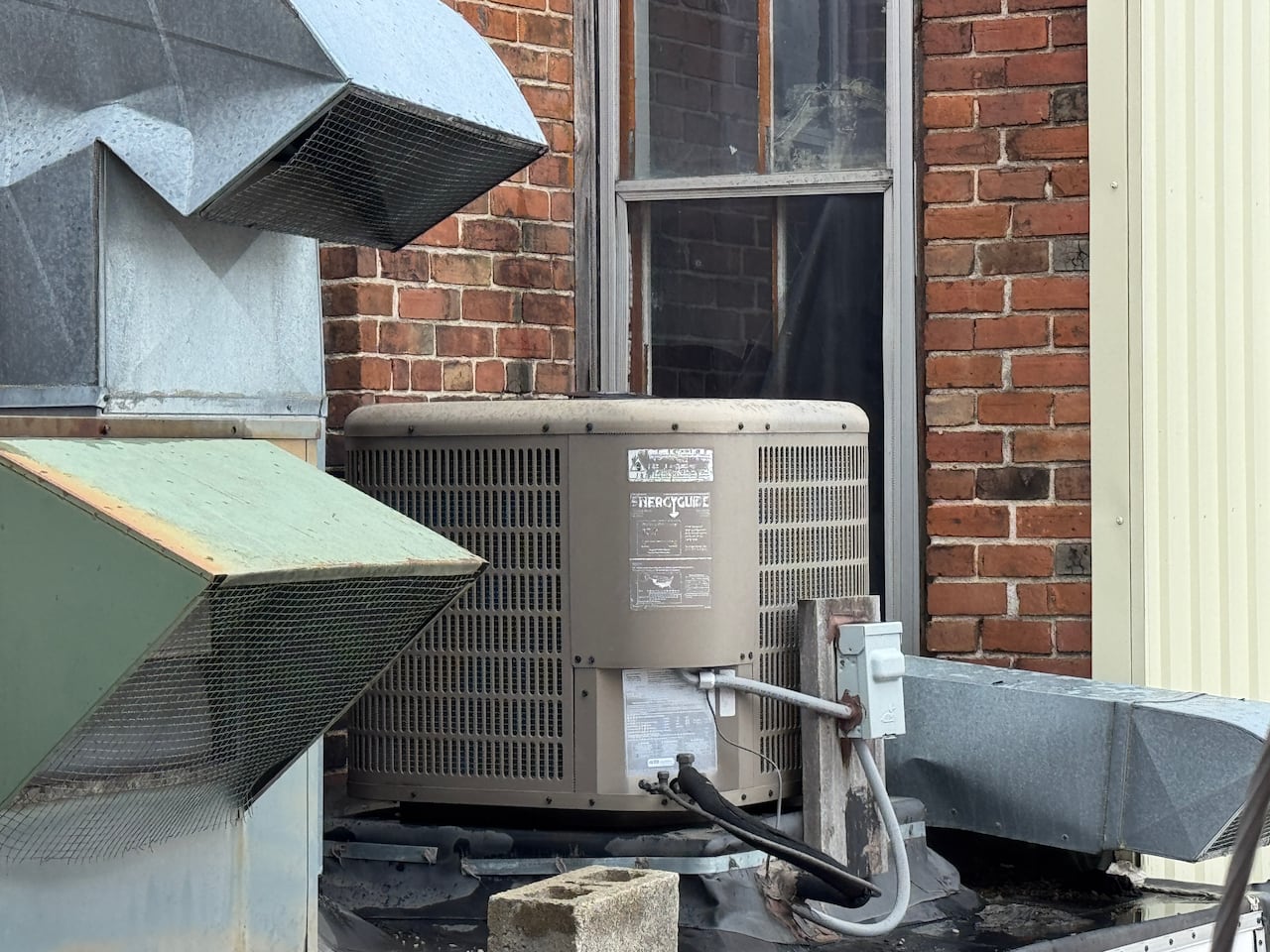 A broken window and screen