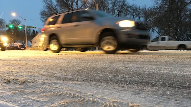 Snow squalls whip across Alberta, triggering weather warnings