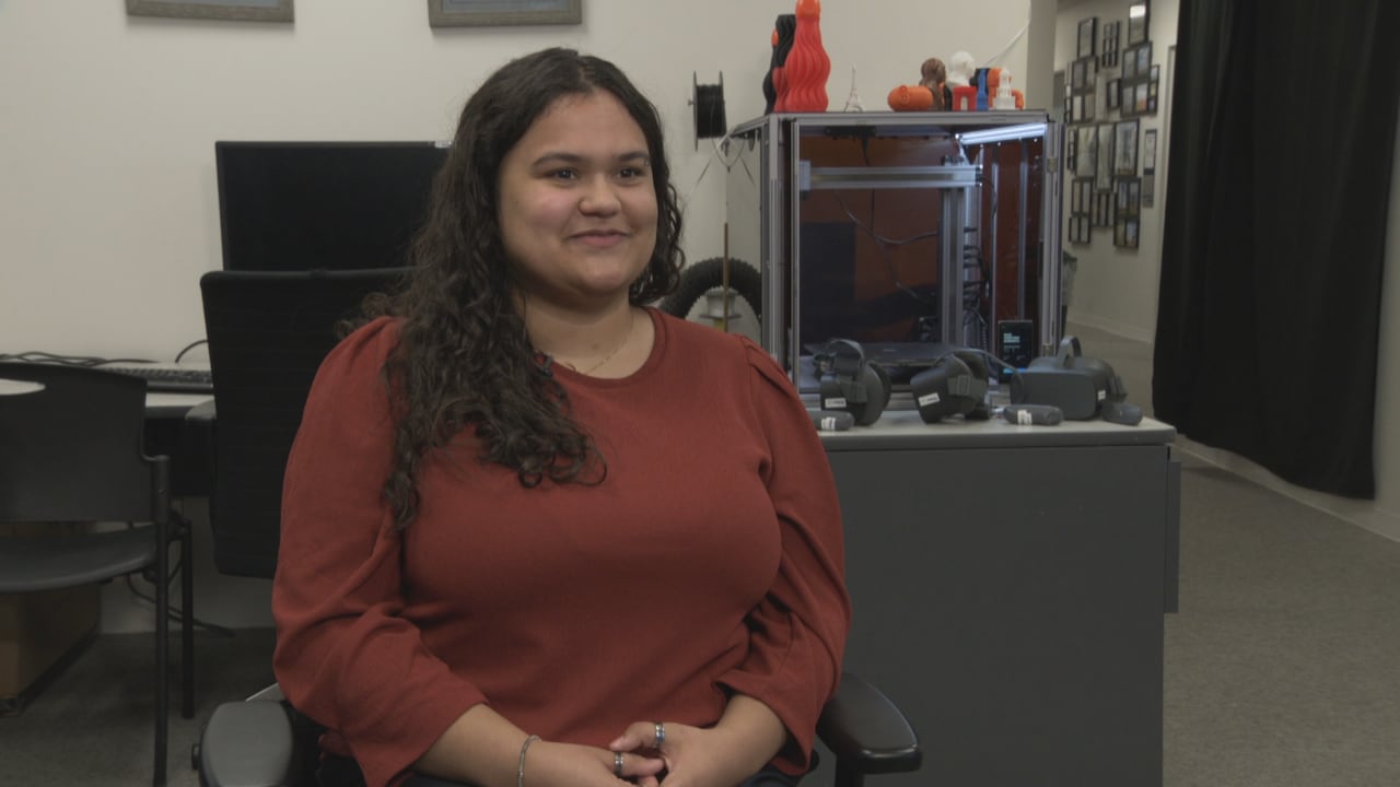 Smiling woman in lab 