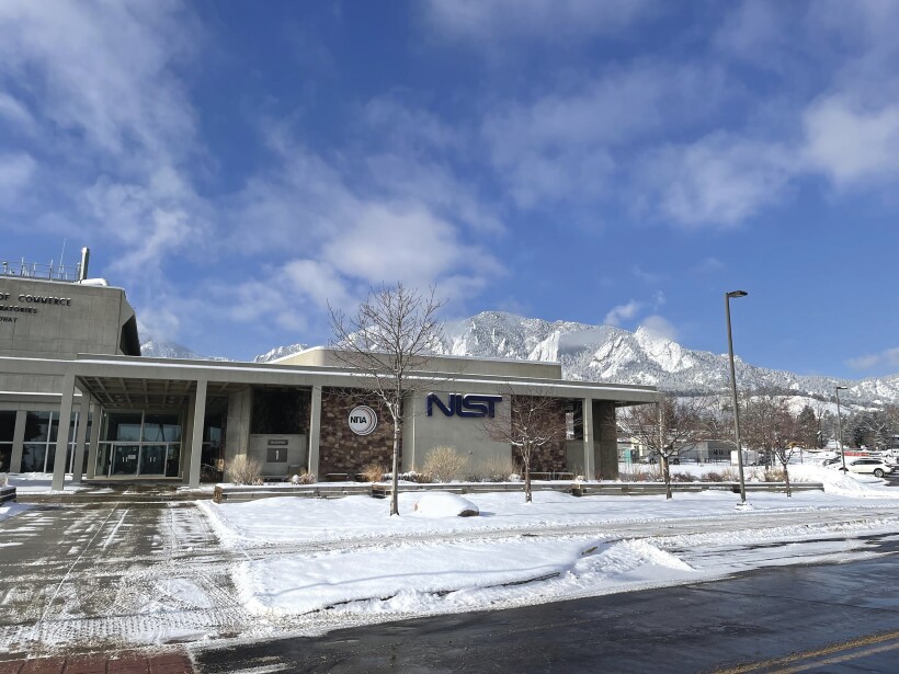 A NIST building with snow in the background.