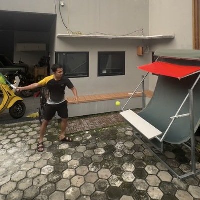 A Clever, Low-Tech, No-Robots Design for a Passive Tennis Partner