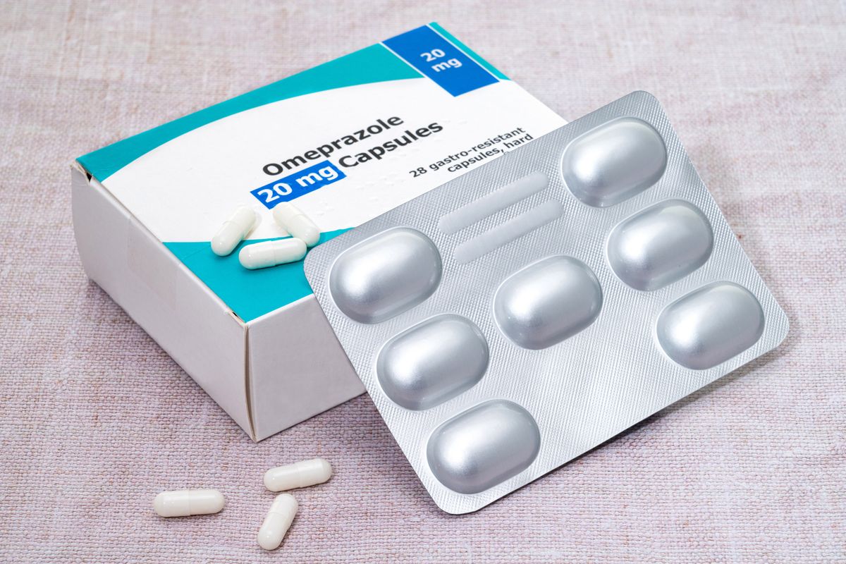 A box and blister pack of generic  Omeprazole pills