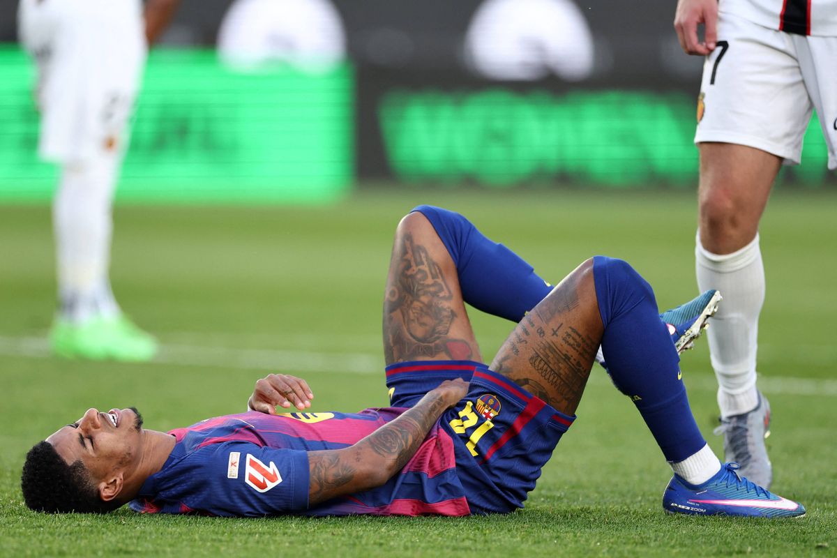 Marcus Rashford reacts to getting hit by the ball